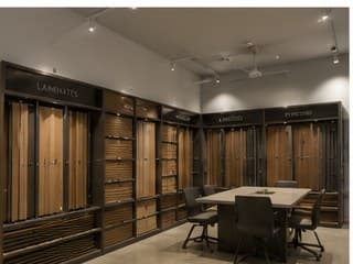 Sri Ganesh Traders showroom, Coimbatore — laminates display and discussion table